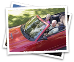 Couple with rented car on vacation